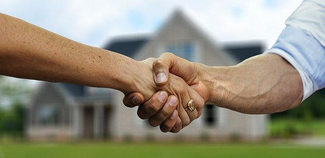 landlord-tenant shaking hands
